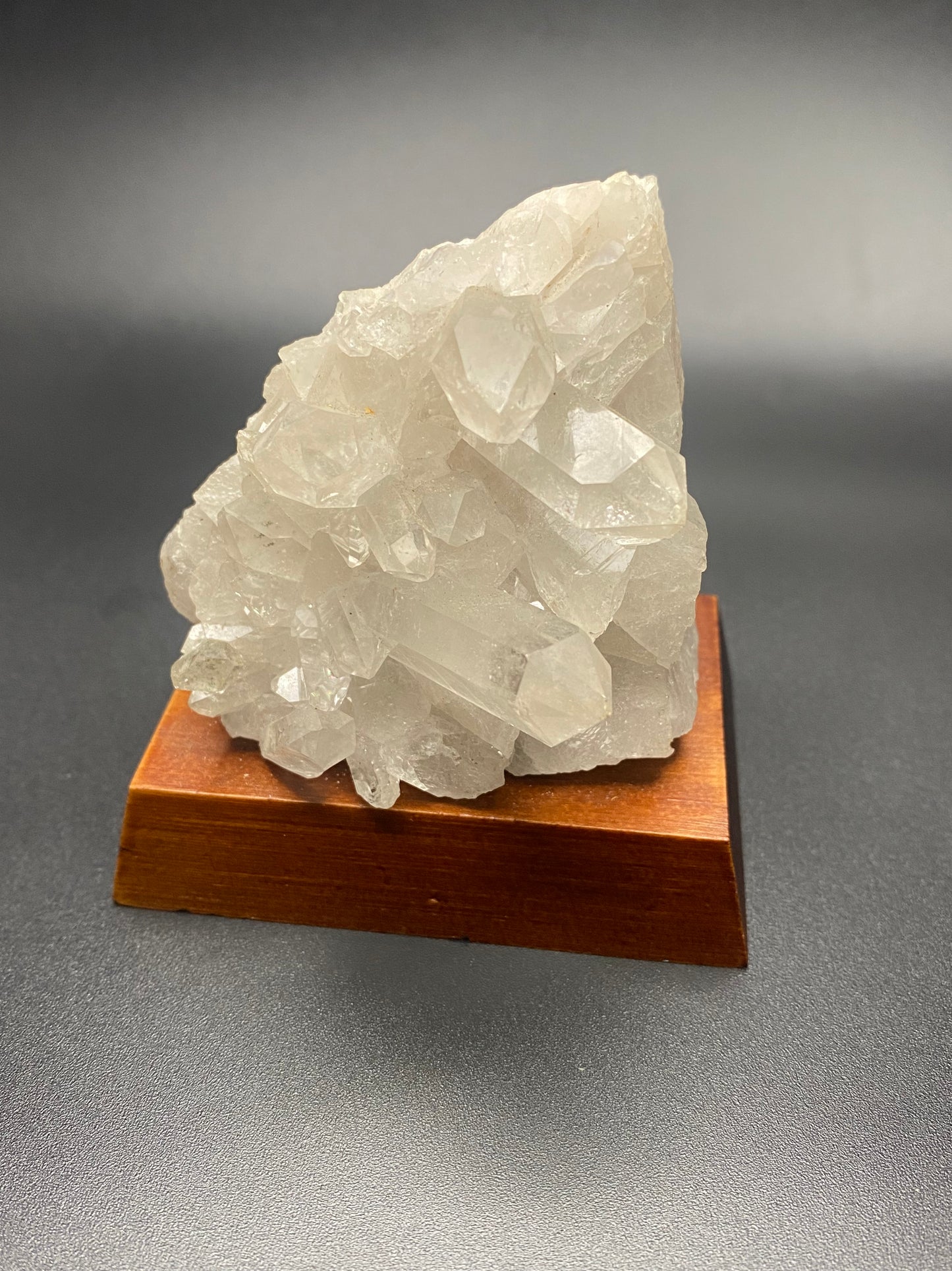 Brazilian Clear Quartz cluster on stand