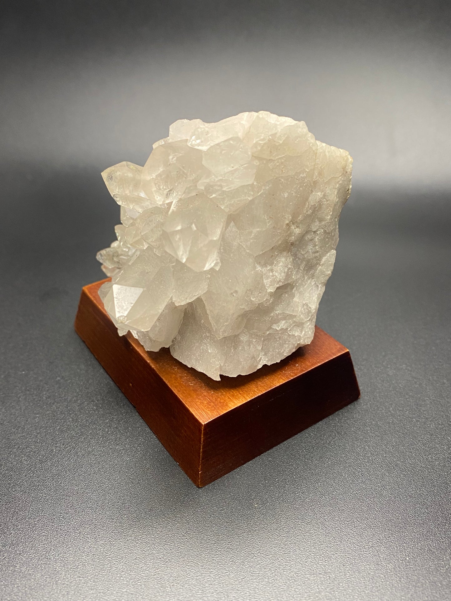Brazilian Clear Quartz cluster on stand